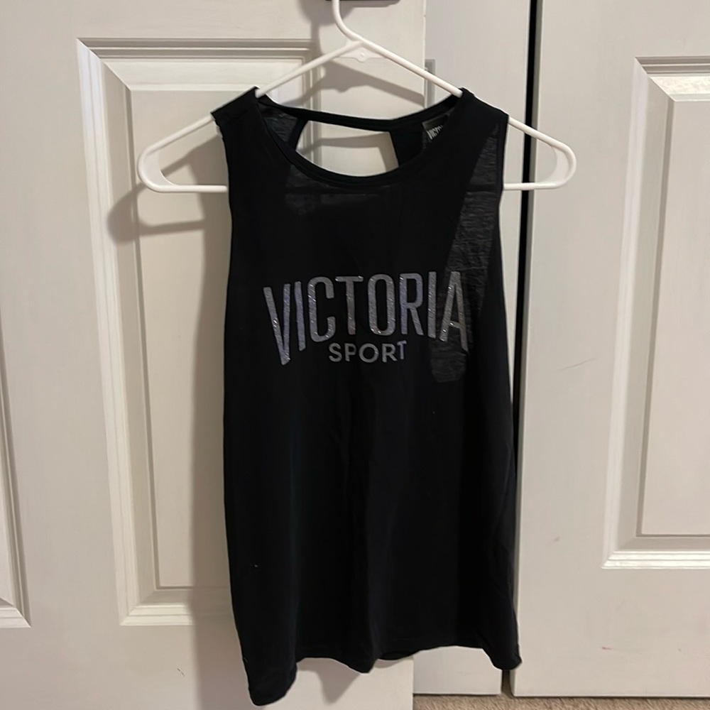 Black athletic top with open back.